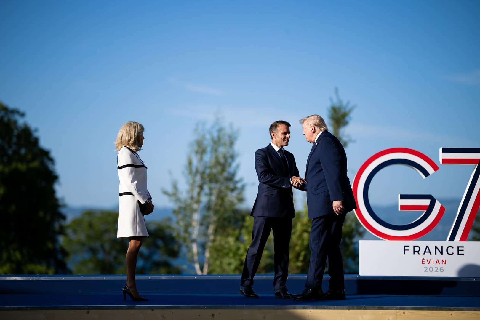 Donald Trump Greeted by French President